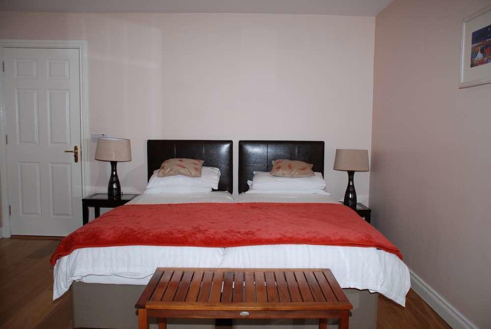 O'Briens Cashel Lodge Rum bild